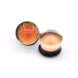 Glass foil dichroic DF plugs in orange with black background, 9/16 (14mm)