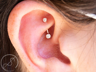 Threaded curved gem barbell in white gold with CZ gems, 16g 5/16