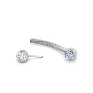 Threadless curved barbell with white CZ gems in titanium, 16g