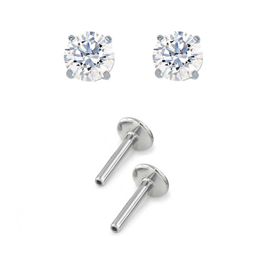 Pair of white gold prong-set earrings with titanium posts for new piercings