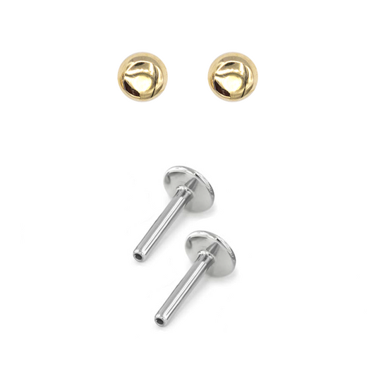 Pair of yellow gold dome earrings with titanium posts for new piercings