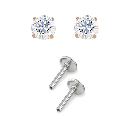 Pair of rose gold prong-set earrings with titanium posts for new piercings